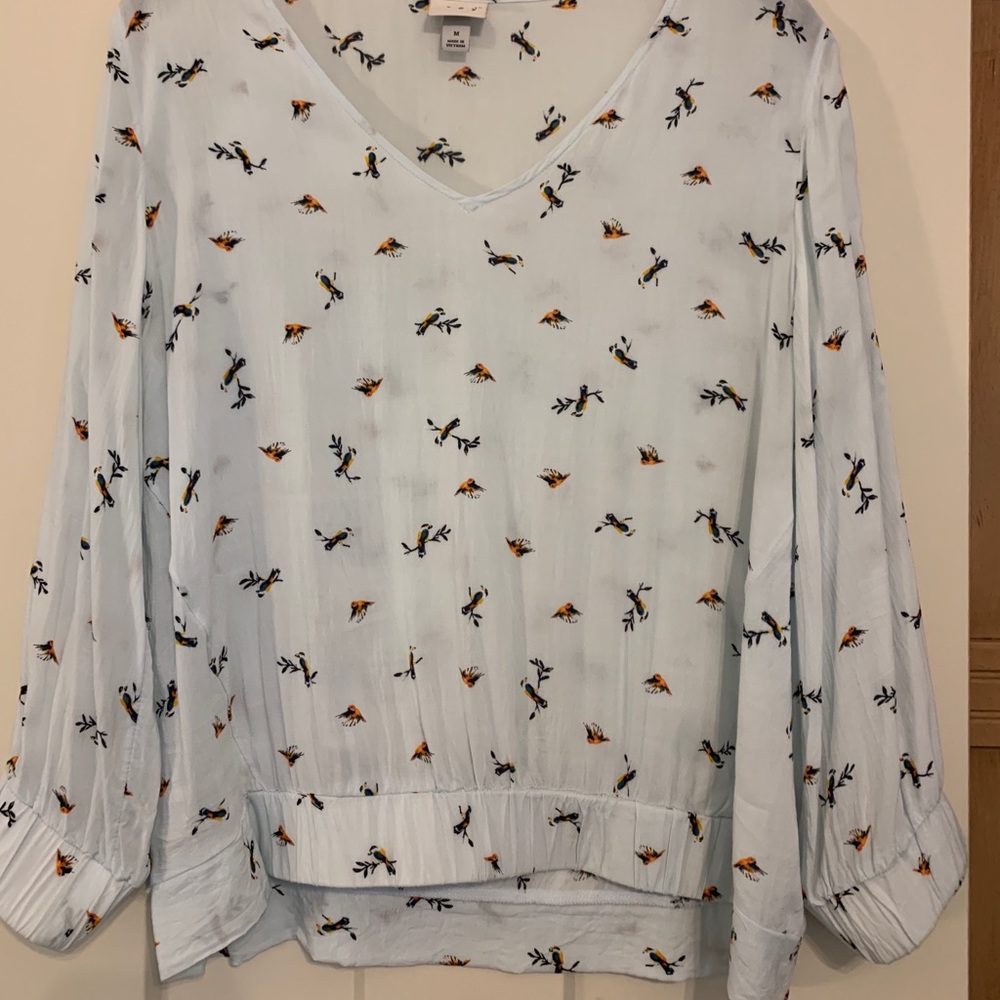 A new day light blue bird top size M